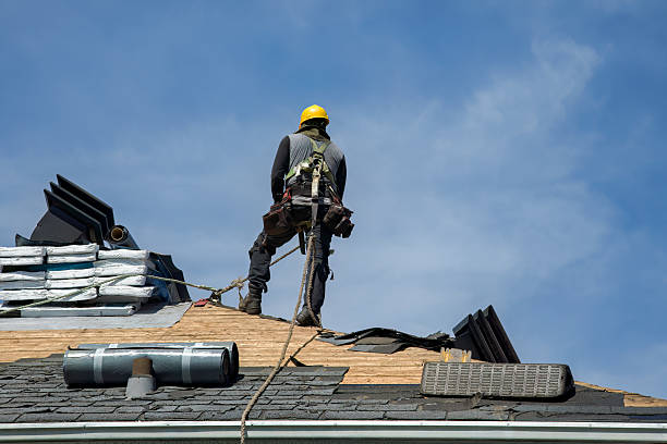 Professional Storm Damage Roof Repair technician working in Bernhards Bay, NY